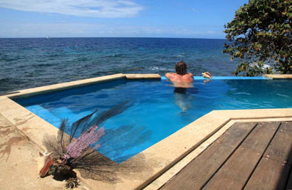 Roatan relaxing in pool